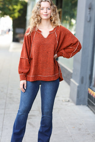 The Slouchy Rust Two Tone Knit Notched Raglan Top