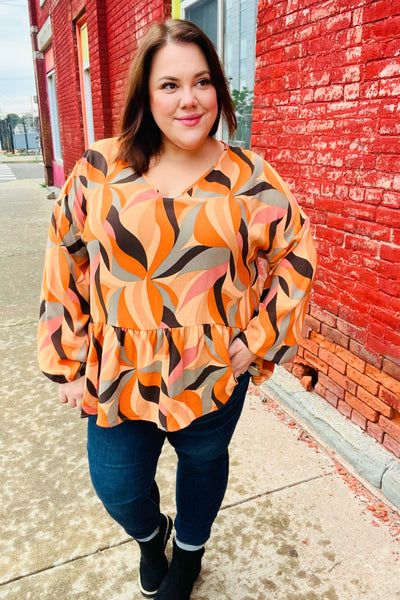 In My Thoughts Rust Abstract V Neck Peplum Top